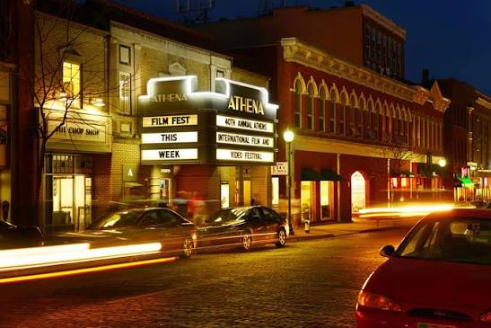 The Athena Cinema marquee on Court Street at night