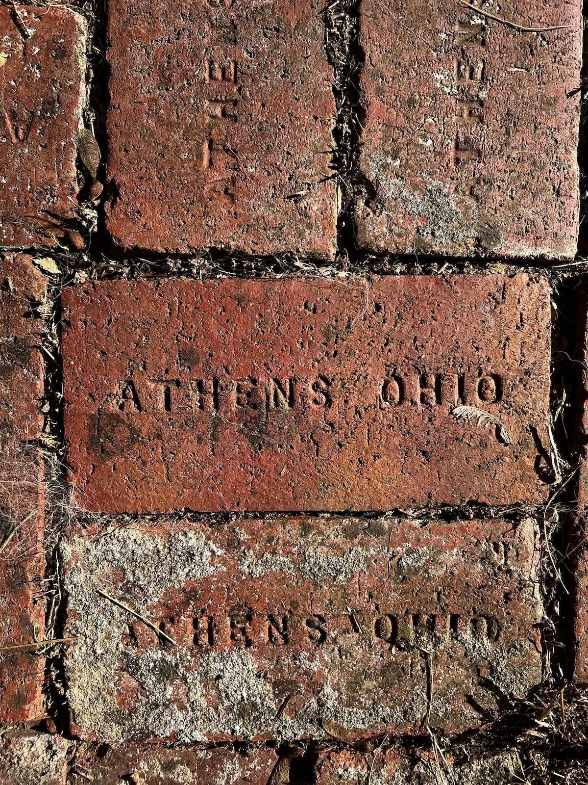 Athens Ohio stamped into the salvaged bricks of the path